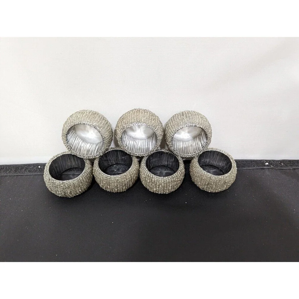 Silver Toned Jewel Look 7 piece Napkin Ring Set